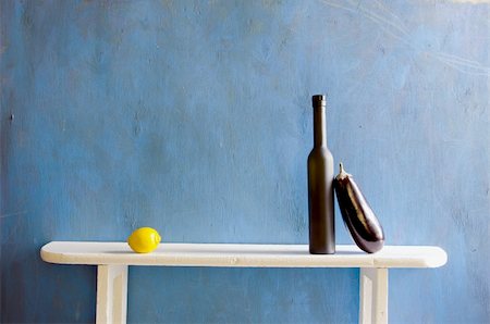 still-life with bottle and vegetables on blue background Stock Photo - Budget Royalty-Free & Subscription, Code: 400-05677482