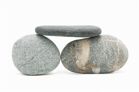 natural stones forming a symbol on a white background Stock Photo - Budget Royalty-Free & Subscription, Code: 400-05677663