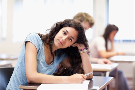 simsearch:400-05677834,k - Calm young student posing in classroom Photographie de stock - Aubaine LD & Abonnement, Code: 400-05677796