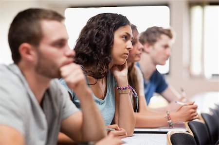 simsearch:400-05684337,k - Students listening a lecturer in an amphitheater Foto de stock - Royalty-Free Super Valor e Assinatura, Número: 400-05677833