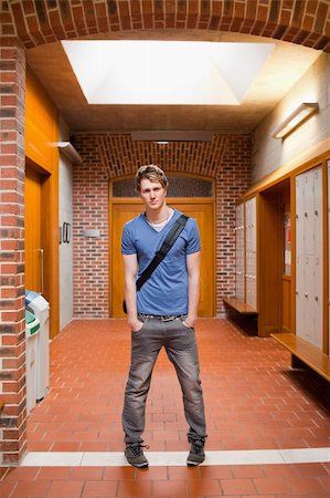 smart models male - Portrait of a student posing in a corridor Stock Photo - Budget Royalty-Free & Subscription, Code: 400-05677875