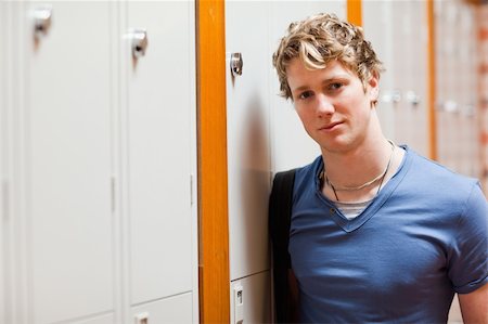 smart models male - Portrait of a student leaning on a locker in a corridor Stock Photo - Budget Royalty-Free & Subscription, Code: 400-05677872
