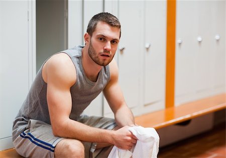 simsearch:400-04256139,k - Young sports student sitting on a bench in a corridor Stock Photo - Budget Royalty-Free & Subscription, Code: 400-05677904