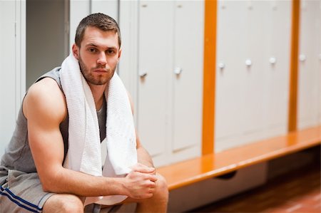 simsearch:400-05677914,k - Handsome sports student sitting on a bench with a towel Stock Photo - Budget Royalty-Free & Subscription, Code: 400-05677908
