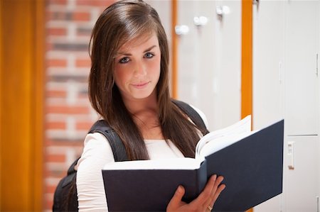 school hallway door - Student holding a book in a corridor Stock Photo - Budget Royalty-Free & Subscription, Code: 400-05677900