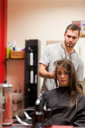 salon pictures with customer in a dryer - Portrait of a hairdresser blowing hair of a customer Stock Photo - Budget Royalty-Free & Subscription, Code: 400-05677946