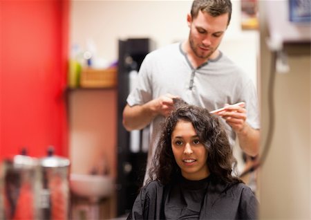 salon advise & consult with clients - Man combing hair with a comb Stock Photo - Budget Royalty-Free & Subscription, Code: 400-05677941