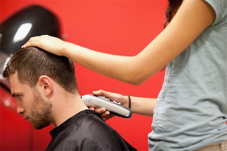 electrical head guy - Male student having a haircut with a hair clippers Stock Photo - Budget Royalty-Free & Subscription, Code: 400-05677968