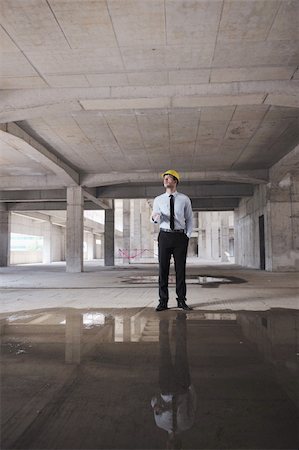 Construction Project business man Architect engineer manager at construction site Stock Photo - Budget Royalty-Free & Subscription, Code: 400-05677963