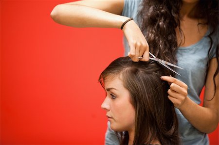 salon advise & consult with clients - Student hairdresser cutting hair with scissors Stock Photo - Budget Royalty-Free & Subscription, Code: 400-05678001