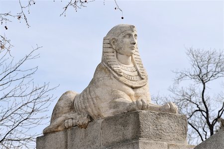 simsearch:400-04985295,k - Egyptian sphinx in Retiro Park (Parque del Retiro) is a huge urban park located in Madrid Spain. Fotografie stock - Microstock e Abbonamento, Codice: 400-05678567