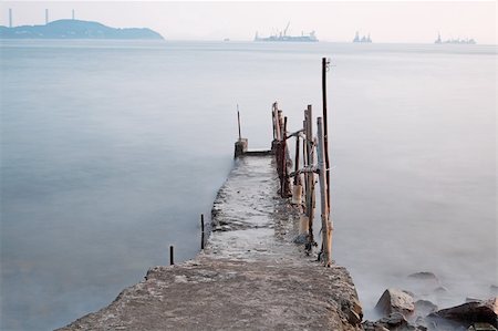 simsearch:400-05947442,k - Bathing pavilion is a structure for bathing and swimming at a sea shore. The structure extended from shore into the sea with a large platform. Now, it is a history buildings in hong kong. Stockbilder - Microstock & Abonnement, Bildnummer: 400-05679083