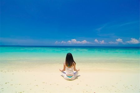 asian girl performing yoga on a beautiful beach Stock Photo - Budget Royalty-Free & Subscription, Code: 400-05679226