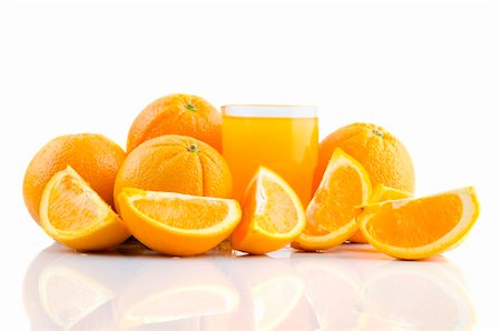simsearch:400-05911768,k - Orange juice and slices of orange isolated on white Photographie de stock - Aubaine LD & Abonnement, Code: 400-05679230