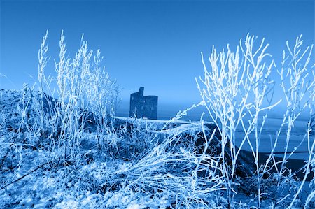 a seasonal snow covered view of atlantic ocean and ballybunion castle beach and cliffs on a frosty snow covered winters day Stock Photo - Budget Royalty-Free & Subscription, Code: 400-05679285