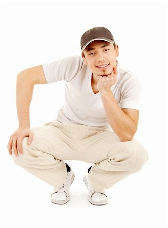 simsearch:400-04234249,k - Smilling young man in a casual dress on white background Stockbilder - Microstock & Abonnement, Bildnummer: 400-05679407