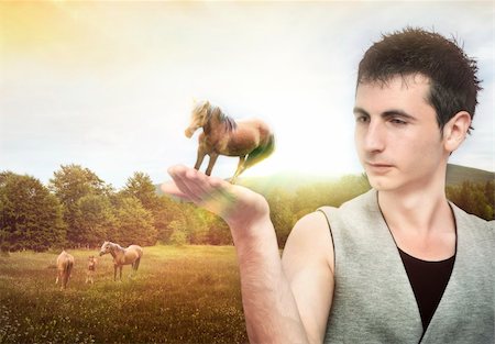 silent47 (artist) - Young man holding a horse Foto de stock - Super Valor sin royalties y Suscripción, Código: 400-05679423