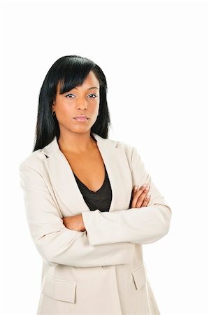 simsearch:400-05677069,k - Determined black businesswoman with arms crossed isolated on white background Fotografie stock - Microstock e Abbonamento, Codice: 400-05670540