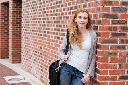 face pack - Cute student standing up looking at the camera Stock Photo - Budget Royalty-Free & Subscription, Code: 400-05670704