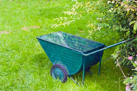 An image of an old green wheelbarrow Stock Photo - Budget Royalty-Free & Subscription, Code: 400-05670920