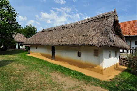 people and thatched houses - Old adobe house as a museum on the countryside in Parád, Hungary. Stock Photo - Budget Royalty-Free & Subscription, Code: 400-05671243