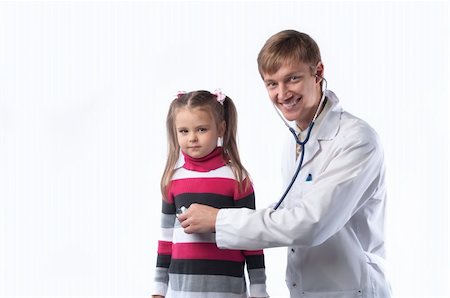 The doctor in a white dressing gown and the little girl at it on reception Stock Photo - Budget Royalty-Free & Subscription, Code: 400-05672150