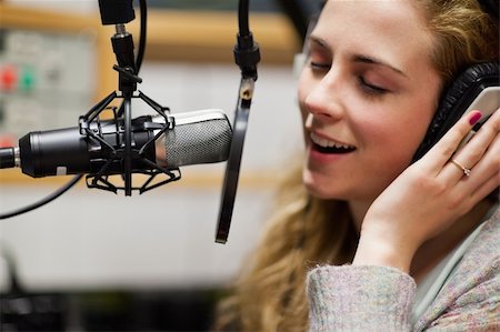 Close up of a singer recording a track in a studio Stock Photo - Budget Royalty-Free & Subscription, Code: 400-05672209