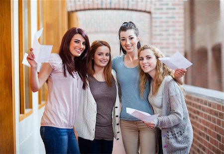 education abstract - Students having their results in a corridor Stock Photo - Budget Royalty-Free & Subscription, Code: 400-05672220
