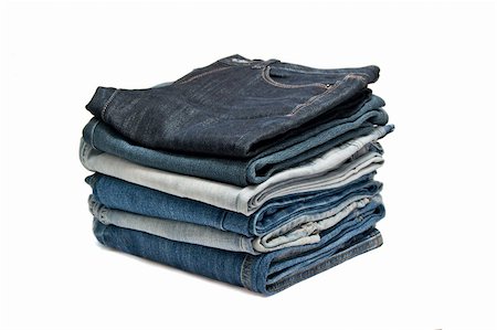 simsearch:400-07770306,k - A pile of jeans on a white background Foto de stock - Royalty-Free Super Valor e Assinatura, Número: 400-05672382