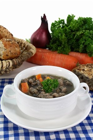 Liver noodles soup with vegetables and parsley in a soup cup Stock Photo - Budget Royalty-Free & Subscription, Code: 400-05673280