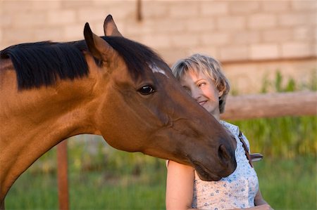 Big Horses head on womans shoulder Stock Photo - Budget Royalty-Free & Subscription, Code: 400-05673612