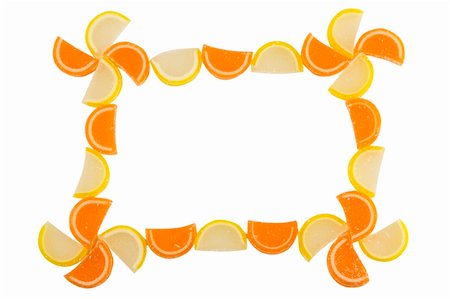 simsearch:400-06135772,k - Frame of Fruit Candy isolated on white background, top view Fotografie stock - Microstock e Abbonamento, Codice: 400-05673812