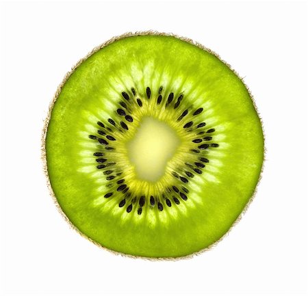 Closeup of kiwi slice isolated on white background Stock Photo - Budget Royalty-Free & Subscription, Code: 400-05673916