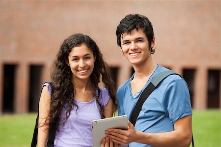 students tablets outside - Couple holding a tablet computer outside a building Stock Photo - Budget Royalty-Free & Subscription, Code: 400-05684099