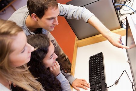 simsearch:400-05684311,k - Fellow students using a computer in an IT room Stock Photo - Budget Royalty-Free & Subscription, Code: 400-05684138