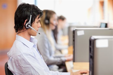 Young operators using a computer in a call center Stock Photo - Budget Royalty-Free & Subscription, Code: 400-05684141
