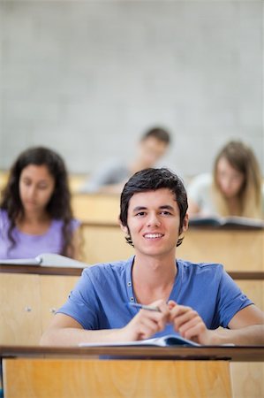 simsearch:400-05684361,k - Portrait of focused students during a lecture with the camera focus on the foreground Stock Photo - Budget Royalty-Free & Subscription, Code: 400-05684330