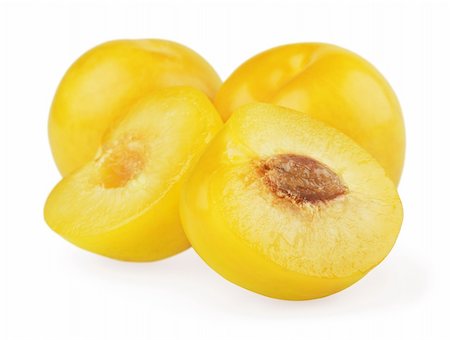 simsearch:400-08530181,k - Yellow plums with halves isolated on white background Stock Photo - Budget Royalty-Free & Subscription, Code: 400-05685634