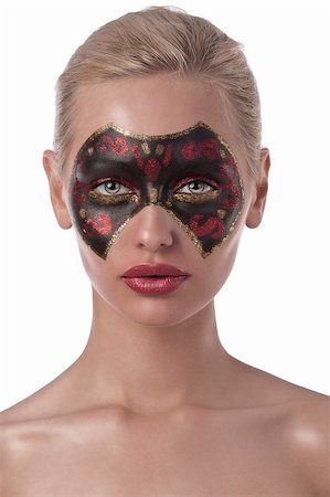 face female mystery - beauty portrait of pretty blond girl with a creative make up like a carnival mask black and red Stock Photo - Budget Royalty-Free & Subscription, Code: 400-05685775