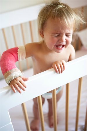 Crying Toddler With Arm In Cast Stock Photo - Budget Royalty-Free & Subscription, Code: 400-05686535