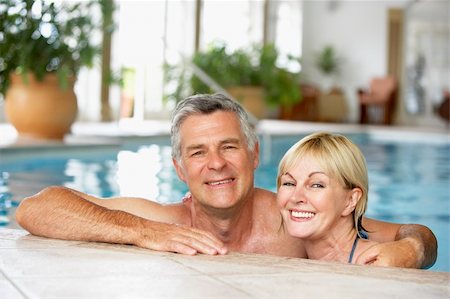 Middle Aged Couple In Swimming Pool Stock Photo - Budget Royalty-Free & Subscription, Code: 400-05686665