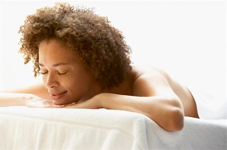 simsearch:400-05686717,k - Young Woman Relaxing On Massage Table Stock Photo - Budget Royalty-Free & Subscription, Code: 400-05686673