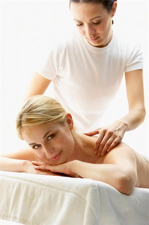 simsearch:400-05686719,k - Young Woman Enjoying Massage Fotografie stock - Microstock e Abbonamento, Codice: 400-05686685