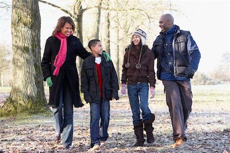 simsearch:400-05686748,k - Family On Autumn Walk In Countryside Fotografie stock - Microstock e Abbonamento, Codice: 400-05686739