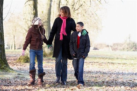 simsearch:400-05686748,k - Mother And Children On Autumn Walk Fotografie stock - Microstock e Abbonamento, Codice: 400-05686744