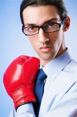 simsearch:400-05718453,k - Businessman with boxing gloves Stock Photo - Budget Royalty-Free & Subscription, Code: 400-05687657