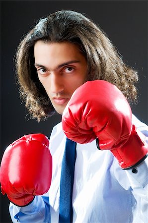 simsearch:400-04131234,k - Businessman with boxing gloves Photographie de stock - Aubaine LD & Abonnement, Code: 400-05687659