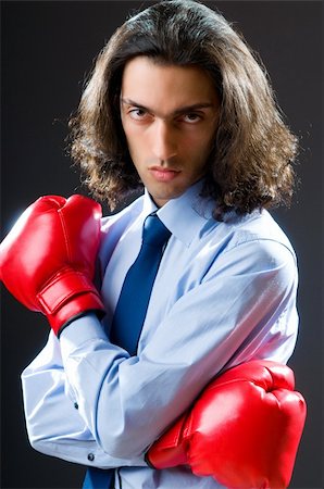 simsearch:400-05218807,k - Businessman with boxing gloves Foto de stock - Royalty-Free Super Valor e Assinatura, Número: 400-05687660