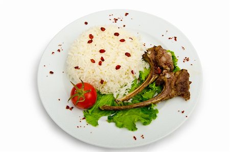 Lamb ribs with rice served in the plate Stock Photo - Budget Royalty-Free & Subscription, Code: 400-05687763