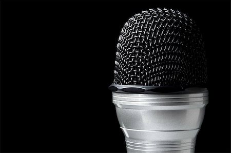 microphone isolated on black background, close up Stock Photo - Budget Royalty-Free & Subscription, Code: 400-05687918